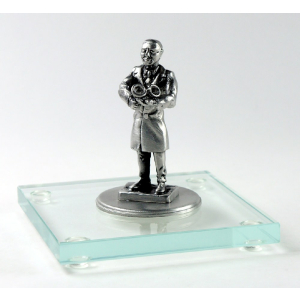 Miniatur Optiker auf Glassockel