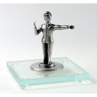 Miniatur Polizist auf Glassockel